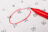 Calendar page with red pen close up. Focus on number 15 in calendar and empty red circle for design in your ideas and work concept